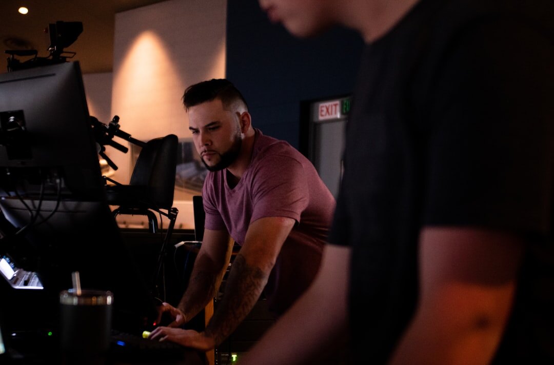 Media production team collaborating in studio
